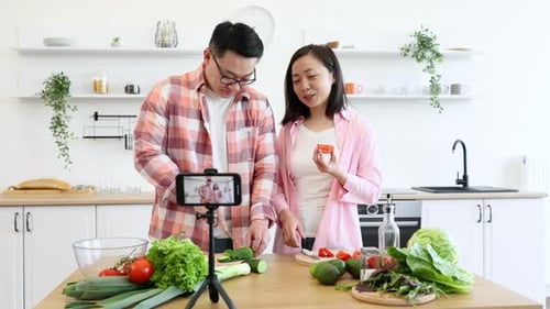 Couple Filming Cooking Vlog