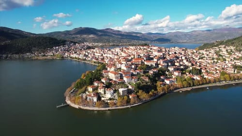 Beautiful Lakeside Town on Peninsula Surrounded by Lush Mountains and Water