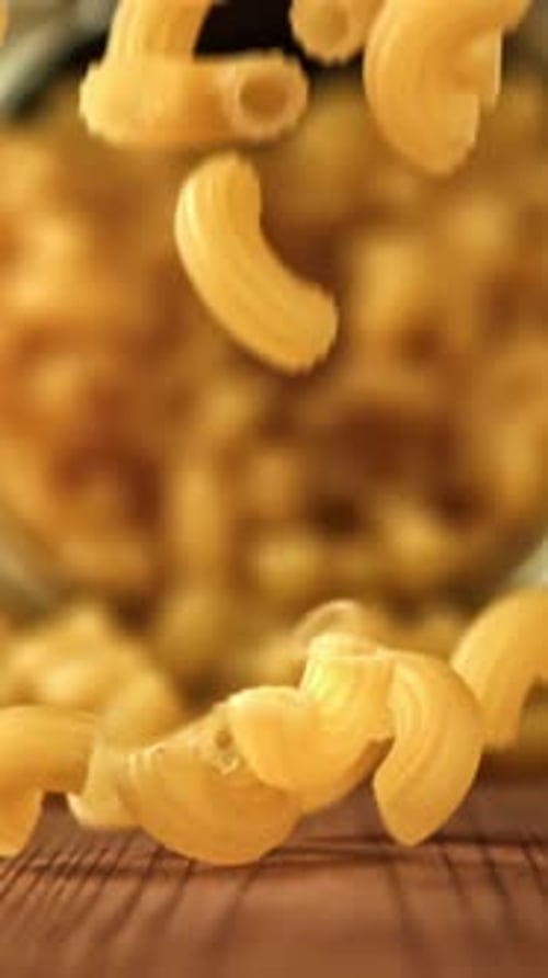 Super Slow Motion Dry Macaroni Pasta Filmed on a Highspeed Camera at 1000 Fps