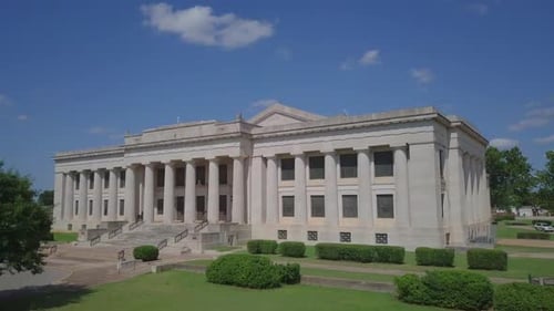 Aerial shot of white house in the blue sky. The White House Side view with beautiful sky