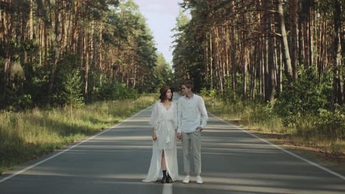 Beautiful Couple in Love Walk in Beautiful Place Hold Hands Man and Woman Hugging and Enjoying