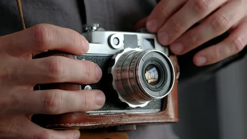 Close-up of Adjusting Vintage Camera