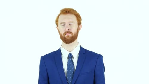 Man in Suit Tilts Head