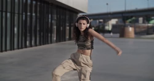 Graceful Woman Dancing in Morning in City