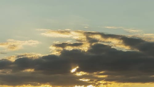Golden Sunset with Dark Clouds Time-Lapse