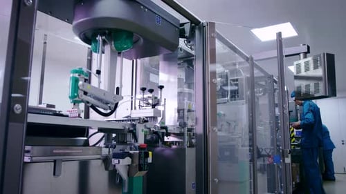 Packaging Line at Pharmaceutical Plant. Chemical Manufacturing Plant. Factory Worker Control Pharmac