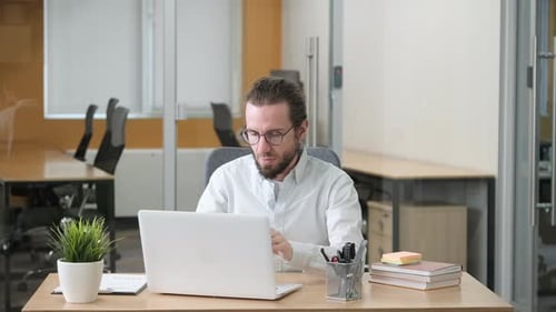 A Man in a Modern Office