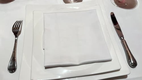 Dining Area Featuring with Simple Table Setting Evoking a Clean and Stylish Atmosphere