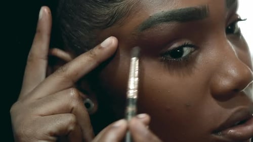 Close-Up Face of Black Latina Young Woman Applying Makeup in Front of Mirror, 20s Adult Girl of