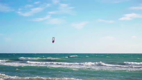 Kite surfer alone on the sea in 60fps