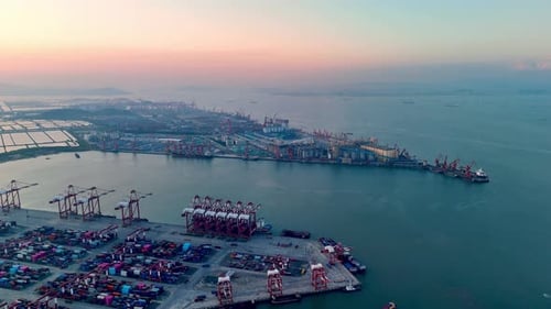 Aerial View Global Logistics Shipping Port with Containers and Cranes