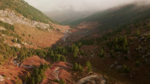 Foggy Mountain Landscape At Sunrise - Beautiful Autumn Scenery In The Valley Of Argentera In Italy -