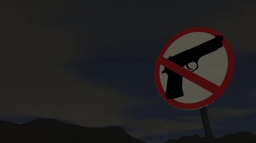 Schild „Keine Waffen“ vor Bergkulisse