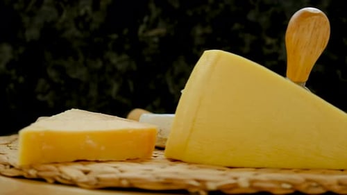 Delicious Cheese Variety with Knives Still Life Close-Up