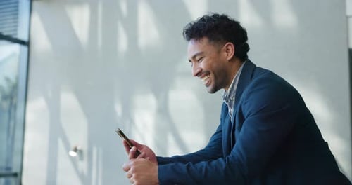 Smile, phone and laughing with businessman in office for networking, social media and online news