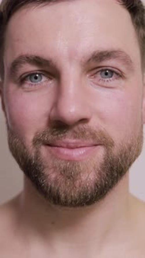 Close Up Portrait of Young Man with Beard