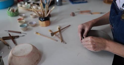 Hands View of a Woman Making Ceramics Objects Inside a Creative Pottery