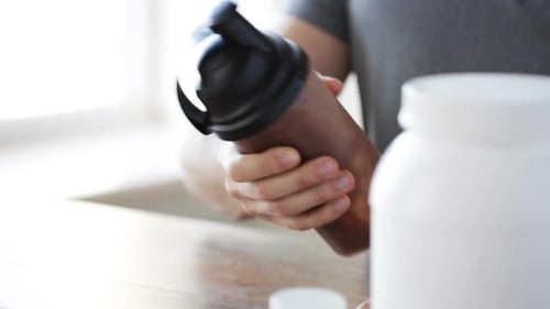 Man Preparing Protein Shake for Fitness