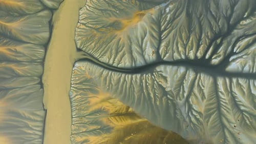 Surreal aerial view of colorful chemical mine waste waters