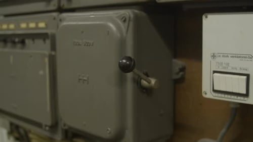 Electrical Boxes and Switches on a Wall