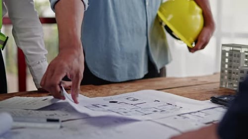 Brainstorming and measuring estimating on construction drawings design architectural and engineering