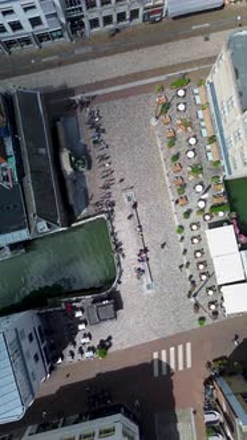 Aerial view charming European city with canals cobblestone streets outdoor cafes historic buildings