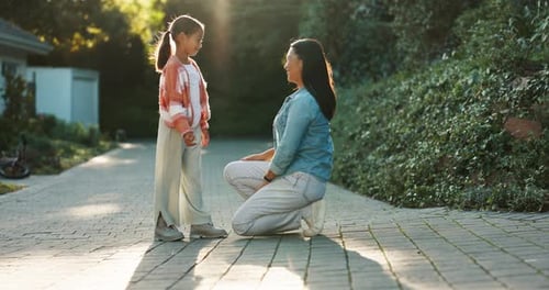 High five, happy and a mother and child in a garden for celebration, support and partnership
