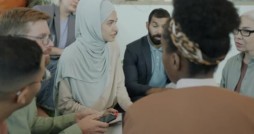 Diverse Professionals Meeting in a Bright Workplace
