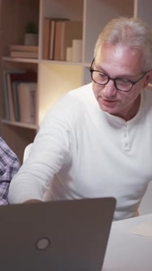 Men Use Laptop at Home