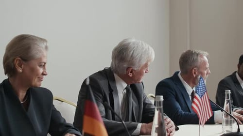 Delegates Discussing During International Political Summit