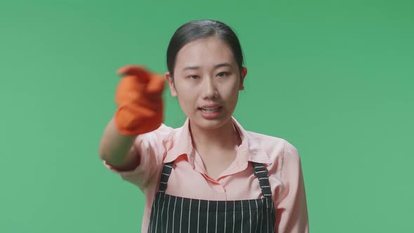 Close Up Of Angry Asian Female Housekeeper Pointing And Shouting In The ...