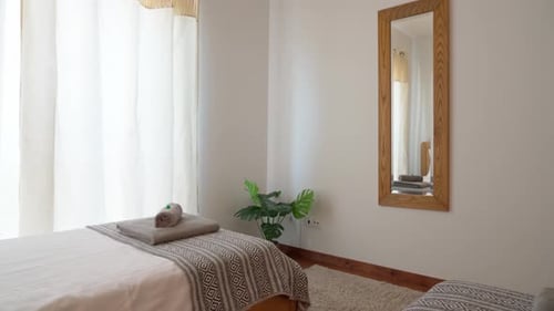 Cozy Traditional Bedroom with a Bed in a Hotel for Relaxing and Sleeping