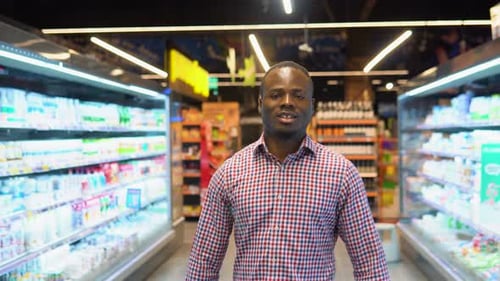 Black Guy Searching for Products While Doing Shopping in Grocery Store