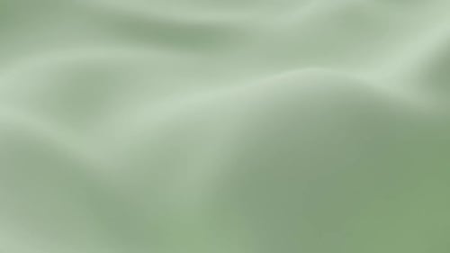 Soft Light Green Silk Fabric Gently Rippling Smooth Waves Creating Elegant Minimal Background