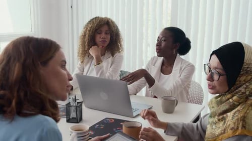 Diverse Team Having a Discussion at Work