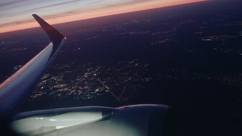 Airplane flying over city