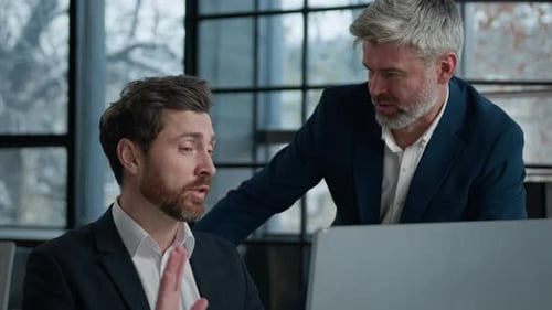 Caucasian Men Businessmen Business Partners Looking Computer Screen in Office Coworkers Argue Shout