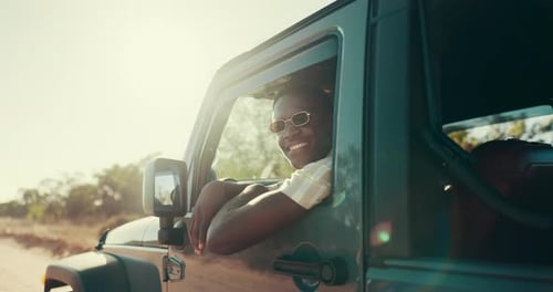 Road trip, adventure and black man with vehicle, smile and journey for vacation, weekend or break