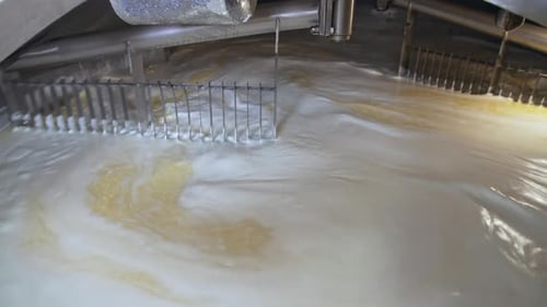 Industrial Machine Mixing Liquid in Stainless Steel Tank