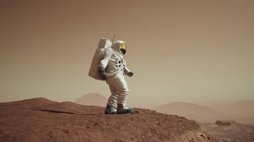 Astronaut Walks To Edge Of A Cliff To View Mars Surface 6