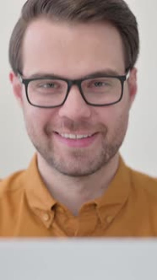 Close Up of Thumbs Up by Young Man with Laptop, Vertical Video