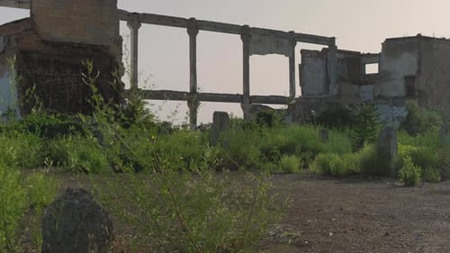 Panoramic view of an old abandoned soviet building that is falling into disrepair.