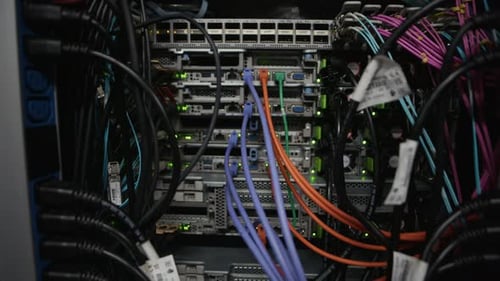 Network Switch and Ethernet Cables Connected in Data Center Server Rack
