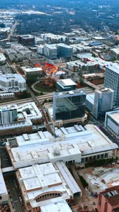 Dense architecture of a modern city on cloudy day. Top perspective on Charlotte, NC, USA.