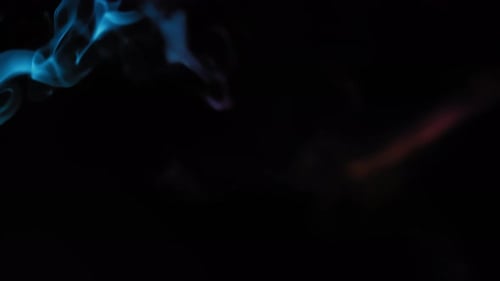 Abstract Colorful Smoke Rising on Black