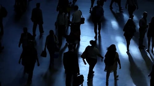 crowd of people crossing street. anonymous commuters walking in the city