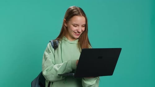 Woman Adding Payment Method on Website Using Laptop
