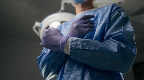 Close Up Hands in a Modern Clinic in a Bright Spacious Operating Room the Surgeon is Fully Prepared