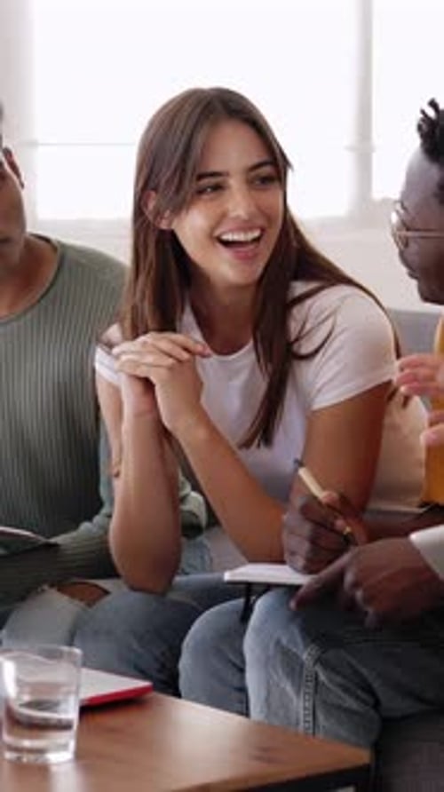 Multiethnic Group of College Student Studying Together Preparing for Exams