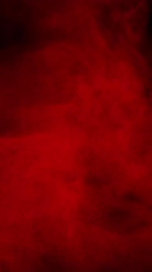 Abstract Red Smoke on Black Background
